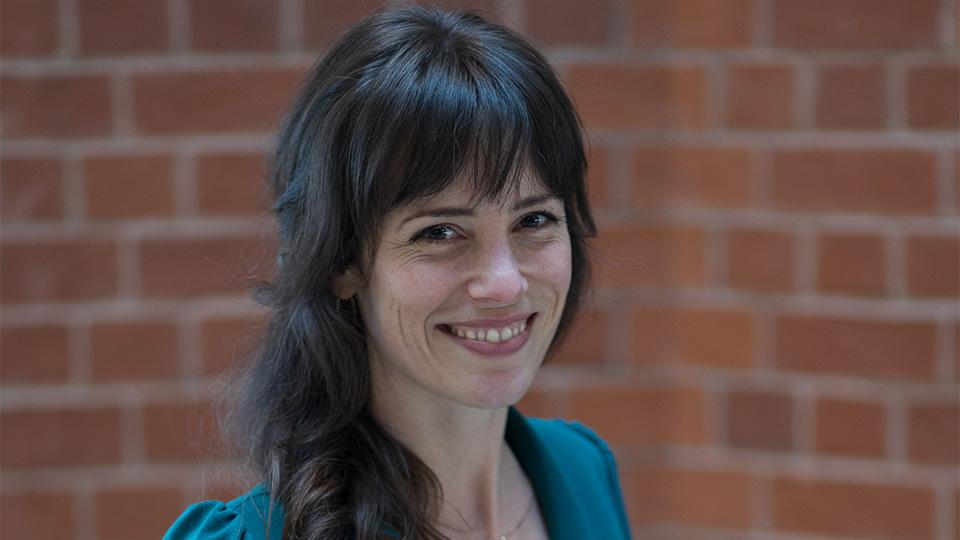 Head shot of Dr Becca Voelcker