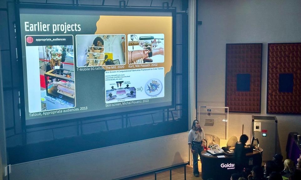 Student Rachele Guzzon presents her project on tattoo robots.