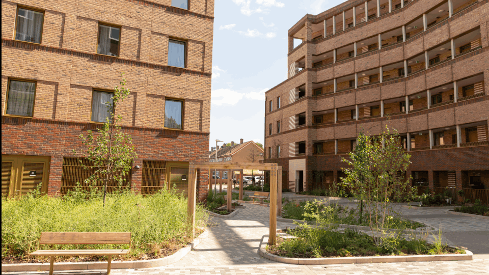 An exterior shot of a new housing development