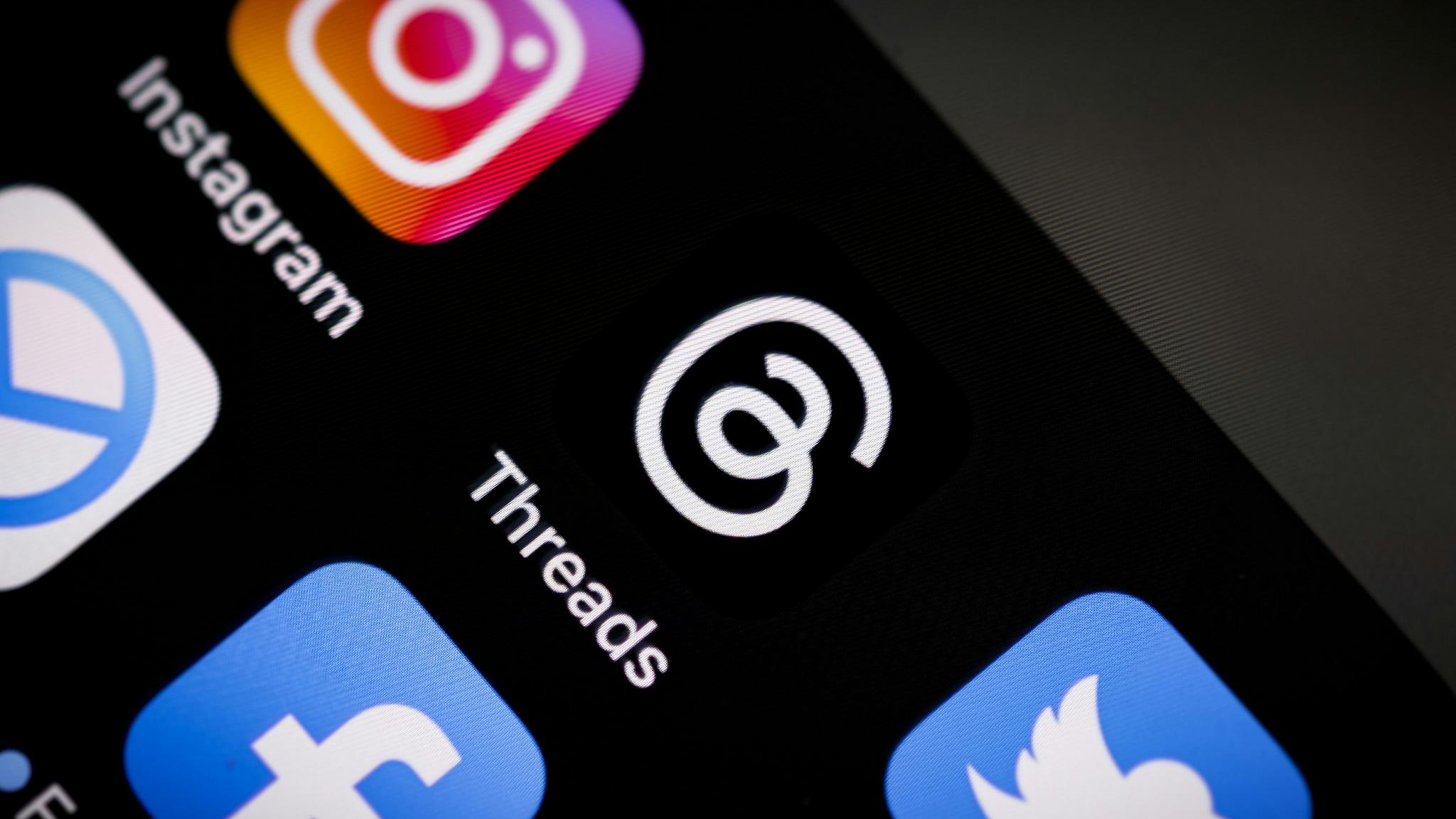 Mobile phone showing social media icons