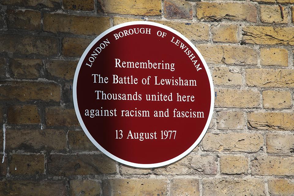 The plaque is unveiled