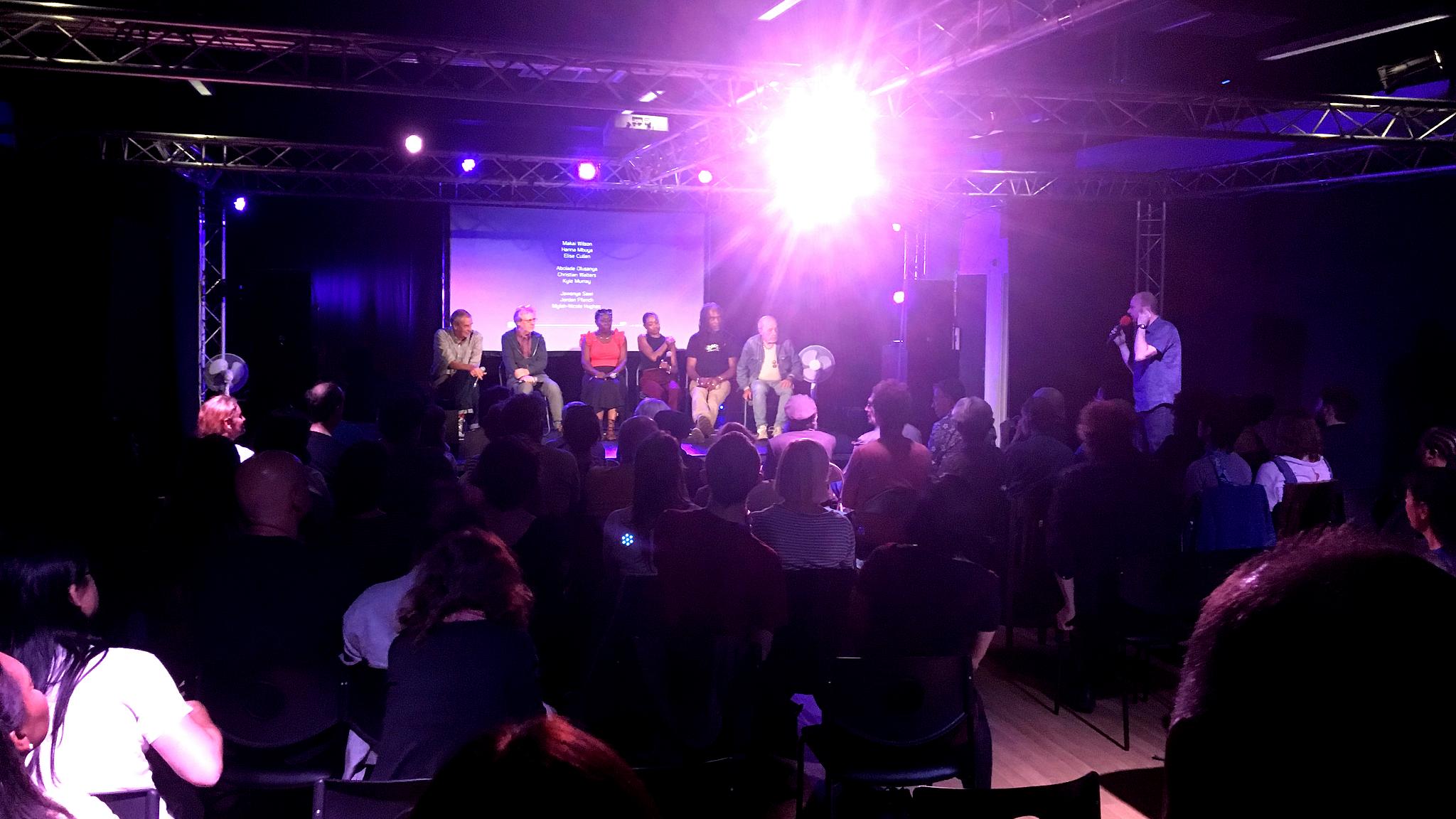 The panel of filmmakers engage with the audience as part of 